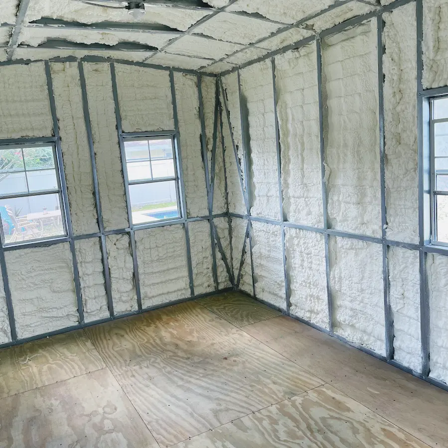 Closed-cell spray foam insulation applied to wall cavities in a residential project in Bloomer